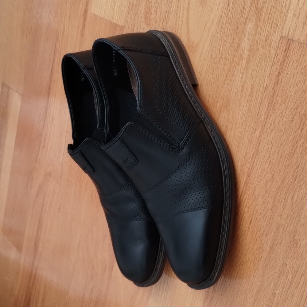 Rieker black leather slip on shoes